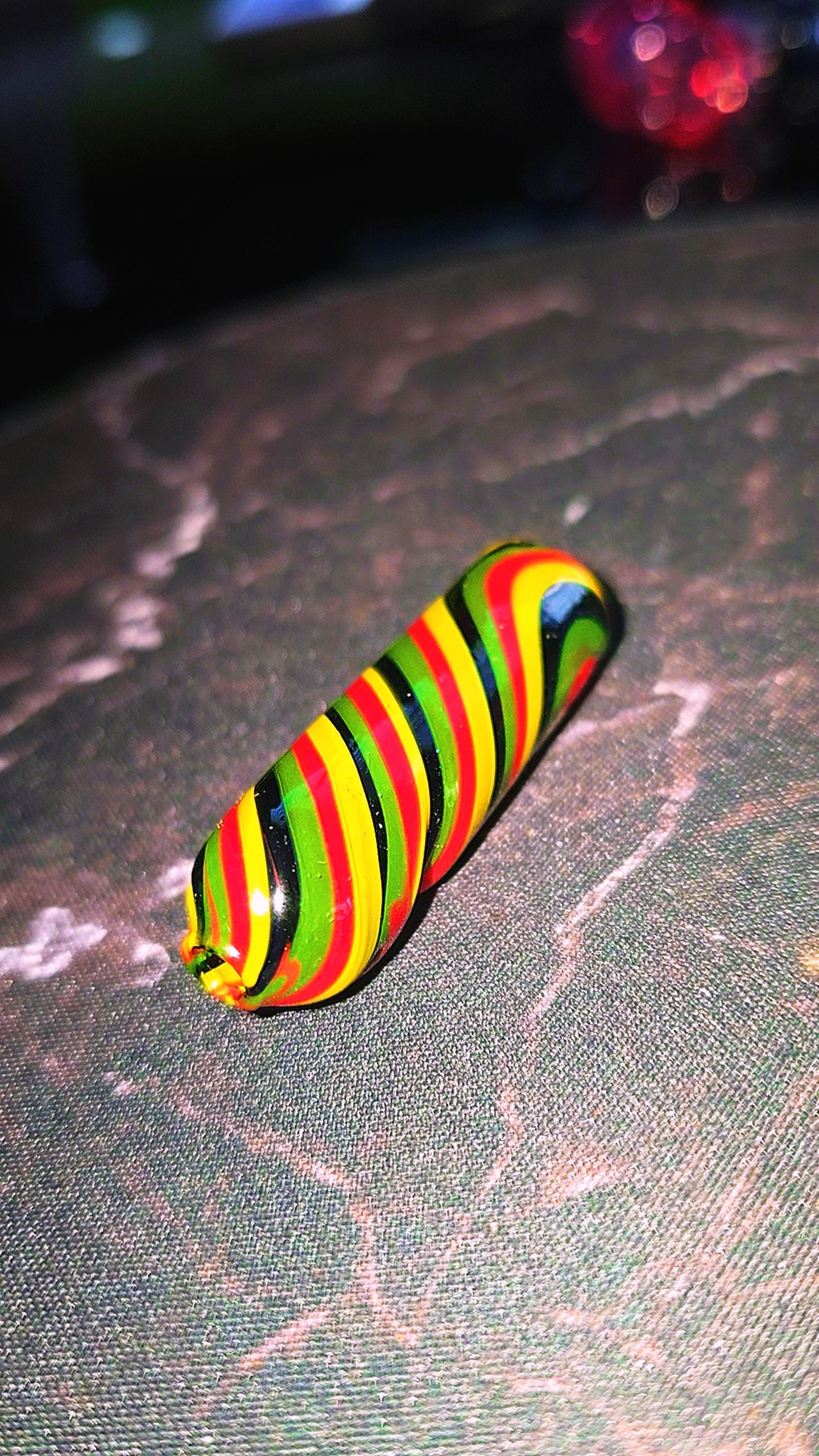 Green Yellow Red & Black Swirl Linework Glass Rolling Tip